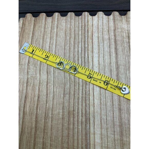 Juicy Couture Silver Interlocking Hearts Bracelet - Picture 6 of 6